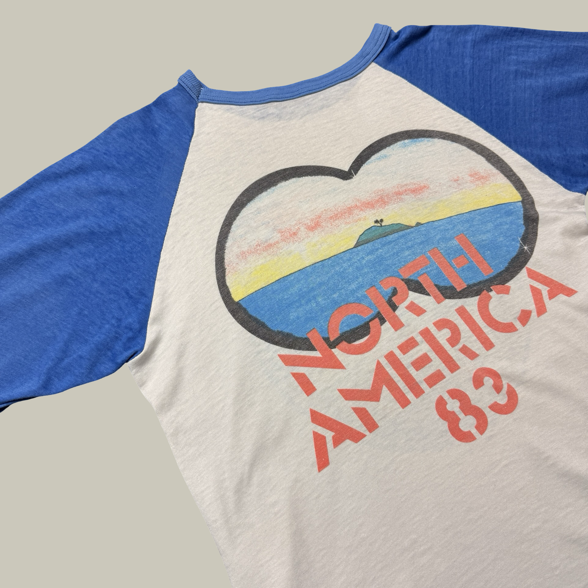 MEN AT WORK 83’ NORTH AMERICAN TOUR RAGLAN SHIRT