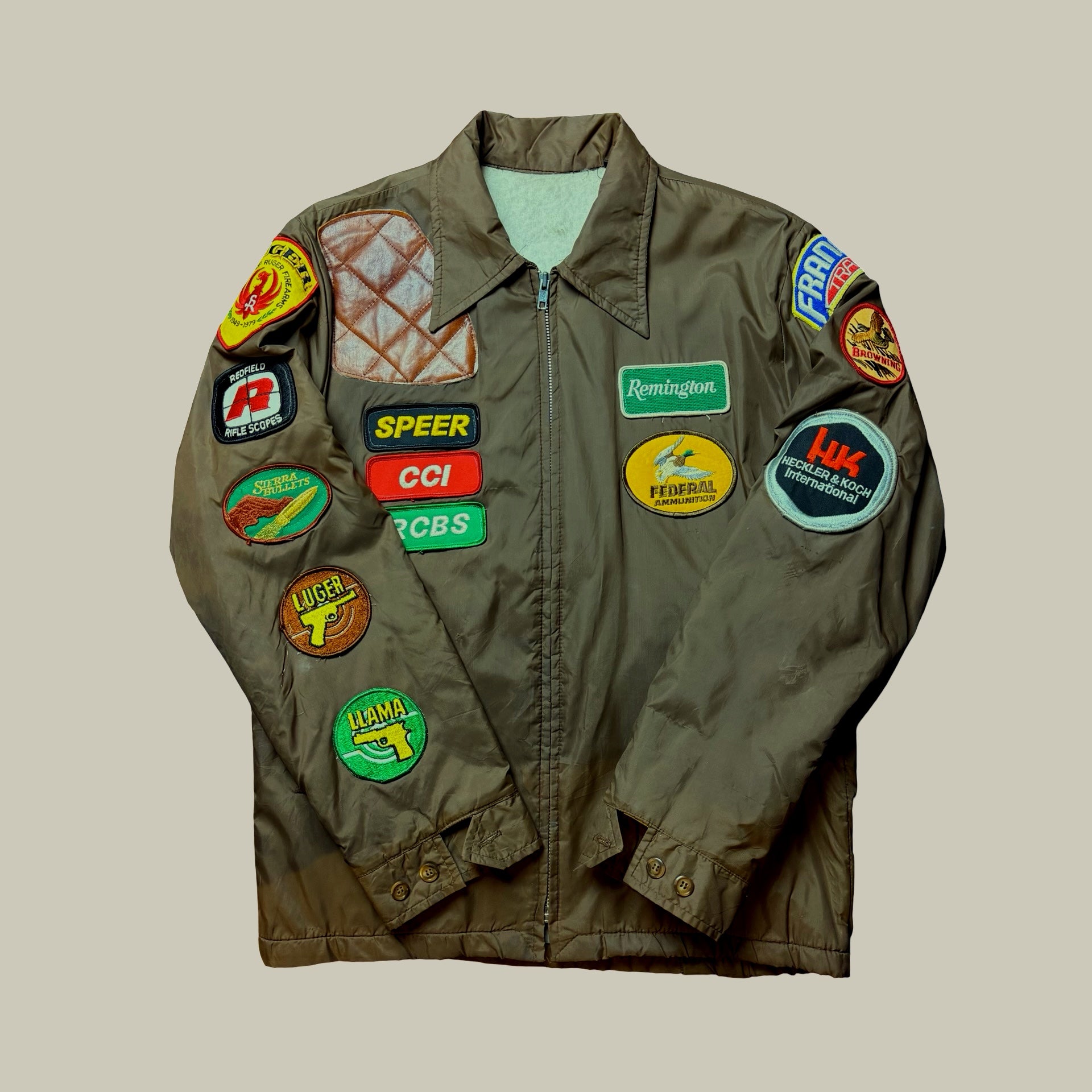 PATCHED FIREARMS & HUNTING WORK JACKET (C. LATE 1970s–1980s)